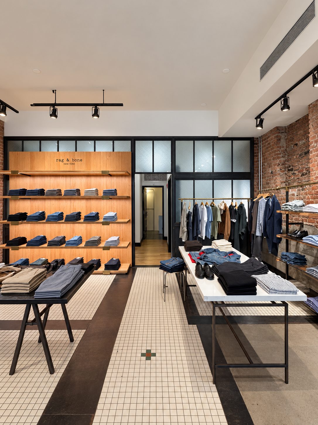 Rag & Bone Brooklyn steel-framed glass partitions and tile inlay flooring